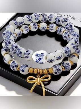 Anthropologie White and Blue Porcelain Bead Bracelet with Gold Bow